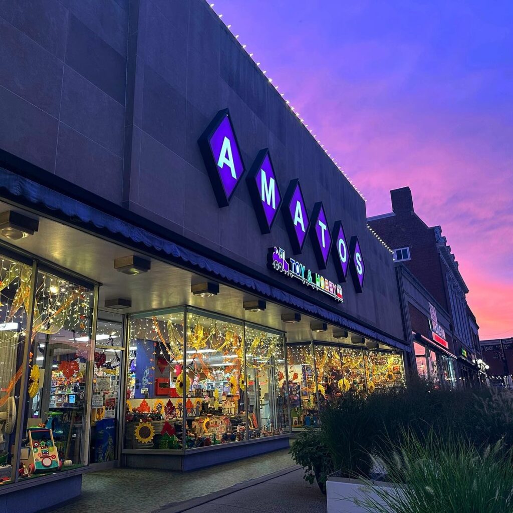 Amato's storefront at sunset